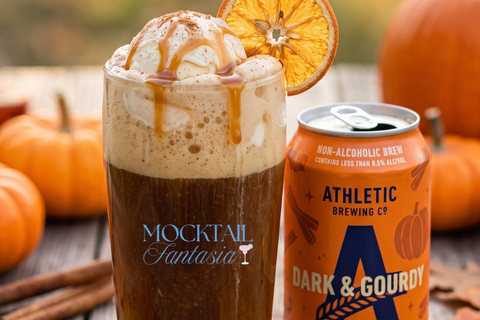 Jack-o'-Lantern Float mocktail in a tall glass topped with vanilla ice cream, caramel drizzle, and a dried orange slice.