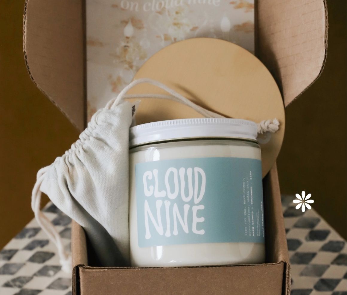 Vellabox Cloud Nine soy candle and muslin pouch in an open kraft box