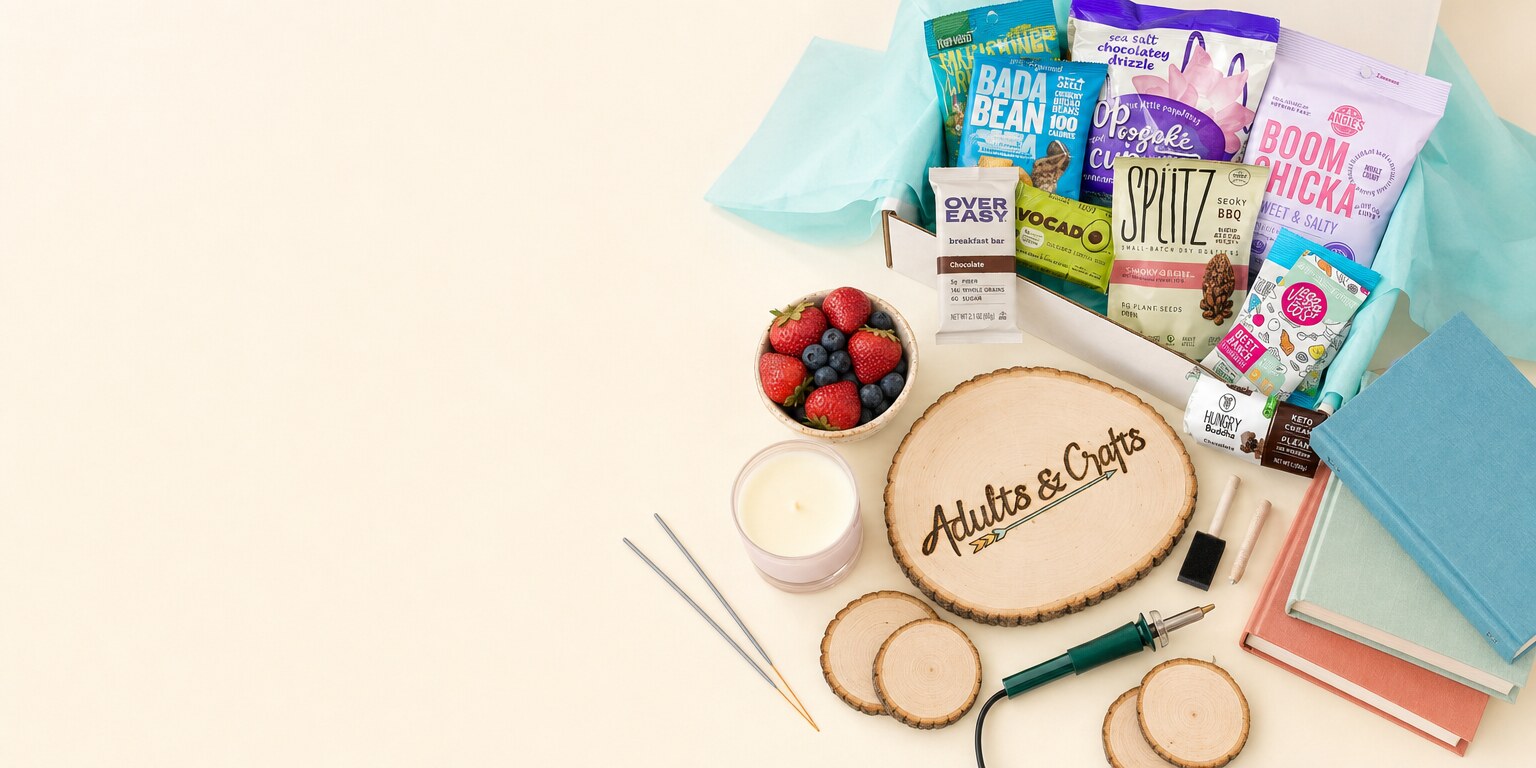 Fourth of July long-weekend spread with a craft kit, snacks, books, fresh berries, and sparklers