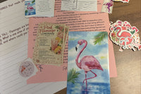 All pieces of the November happy mail arranged in a flat lay. The Stand Tall journal page, stickers, print, collector card and recipe card
