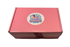 Monthly organic dog treat subscription box with small-batch gourmet treats