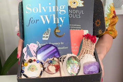 Mindful meditation box with spiritual items like crystals, book, home decor crafted for a calming and harmonious meditation experience.