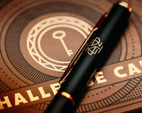 Very high quality close up photo of a mystery box subscription crate or an escape game with a pen on top of it.