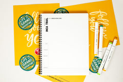 monthly sketchpad with daily drawing prompts with the theme grand adventure and drawing prompts that relate to locations and adventures.