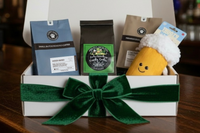 Coffee & Pet Box includes:
One 12oz bag of coffee
One Large bag pet treats
One Pet Toy
One lagniappe gift for the human