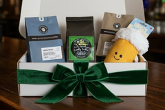 Coffee & Pet Box includes:
One 12oz bag of coffee
One Large bag pet treats
One Pet Toy
One lagniappe gift for the human