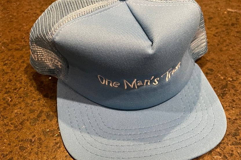 Comma, 'One Man's Trash' Trucker Hat