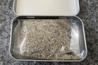 Inside of tin. Contains 1/3oz of our all natural, organic catnip, sealed, and always fresh. Maintains freshness until needed.