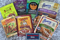 This picture shows several types of seasonings for tacos, seasoning for carnitas (pork), jalapeno gravy as well as sweet cream baking mix.
