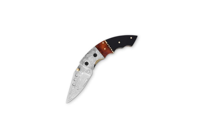 The Curved Damascus knife. Utilizes modern Damascus steel, a 7-1/2” overall length curved folding knife. 