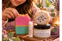 Girl enjoying handmade rainbow soap with vanilla lip balm and body butter from the Grace & Glow subscription box.