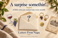 Letters From Napa mystery extra illustration with wine charms, stickers, and a wine label. Monthly surprises vary - one per month 