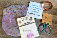 Box of Blessings featuring India & Sr Lanka: turquoise diamond hoop earrings, cooper cuff, sari bowl cover, Mr. Ellie Pooh manget
