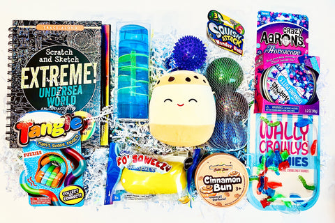 Scratch & Sketch, spiral timer, spiky LED ball, Thinking putty, Tangle, Twinkie squish, scented putty, Wally Crawlys, Plush, glitter balls