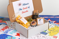 The Illinois box, "The Land of Lincoln". Here you can see all things red white and blue. This box includes a plant and other unique items.