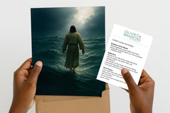 Hands holding an 8x10 print of Jesus walking on water during a storm, alongside a June Olive Branch Art Series devotional card