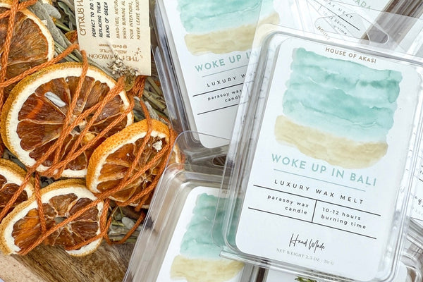 house of akasi body oil, dry oil for the body, not too oily body oil, and candles and wax melts. These are included in the box from time to 