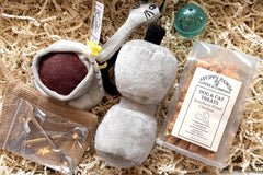 Paws for A Cause - Cat Box includes:
Two cat toys
One Large bag pet treats
One Lagniappe gift for the human