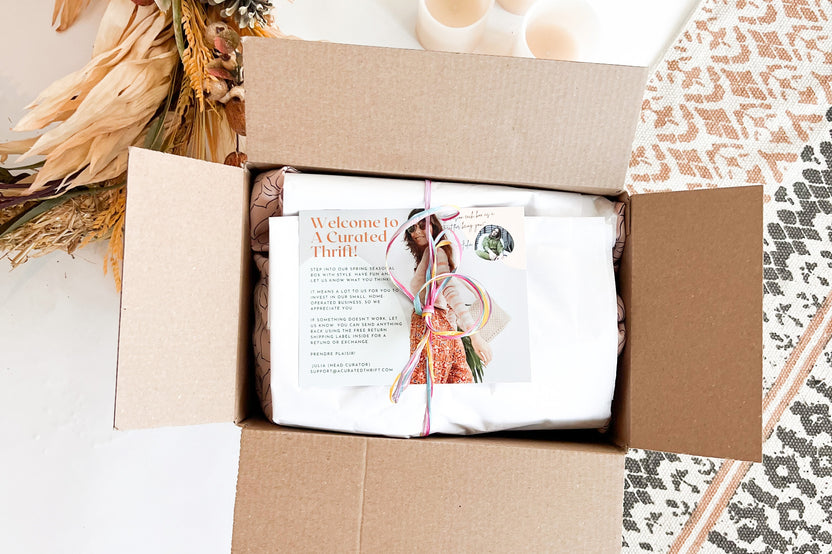 Example of our box wrapped up with recycled tissue paper, cardboard box and even recycled cardstock wrapped in twine. 