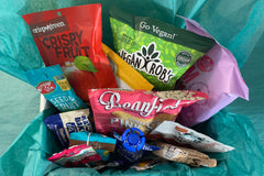 Sample box with Vegan Rob's, Beanfields, Crispy Fruit, Enjoy Life, Nature's Bakery and more.