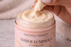Close-up of Sacred Trinity whipped body butter texture, showing rich, creamy consistency and handcrafted luxury skincare quality
