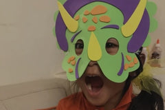Photo of a dinosaur mask craft in our Dinosaur box