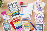 Personalized stationery collection featuring custom notebooks, notepads, calendar, and floral paper goods.