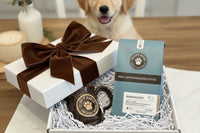 Box includes: 
one full-size  12oz bag of coffee , 
a themed lagniappe gift for the human 
and a sample treat for your furry friend