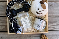 Box includes: One full size bag dog treats,
One Chew Toy
One Plush/Rope/Ball
One themed gift for the human 