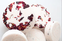 Handcrafted lavender and rose bath bombs for self-care days. Sodium Bicarbonate, Citric Acid, Pink Sea Salt, and Coconut Oil.