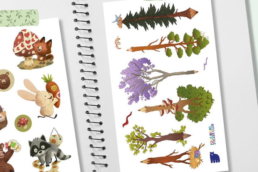 An open notebook featuring two sticker sheets - one with pencil shaped trees and another with woodland animals using stickers.