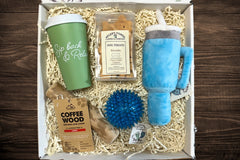 Box includes:
One full size bag dog treats,
One Chew Toy
One Plush/Rope/Ball
One themed gift for the human 
