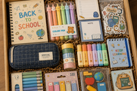 Back to School Box

Happy Mail Stationery Club back-to-school stationery subscription box with notebook, pencil pouch, pens, highlighters, s