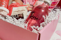 Discover a stylish pink mocktail box filled with refreshing non-alcoholic drinks, perfect for any occasion.