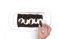 Cookies & Cream Swiss Roll : velvety chocolate sponge rolled with cookies & cream filling, rich, smooth, and nostalgic.