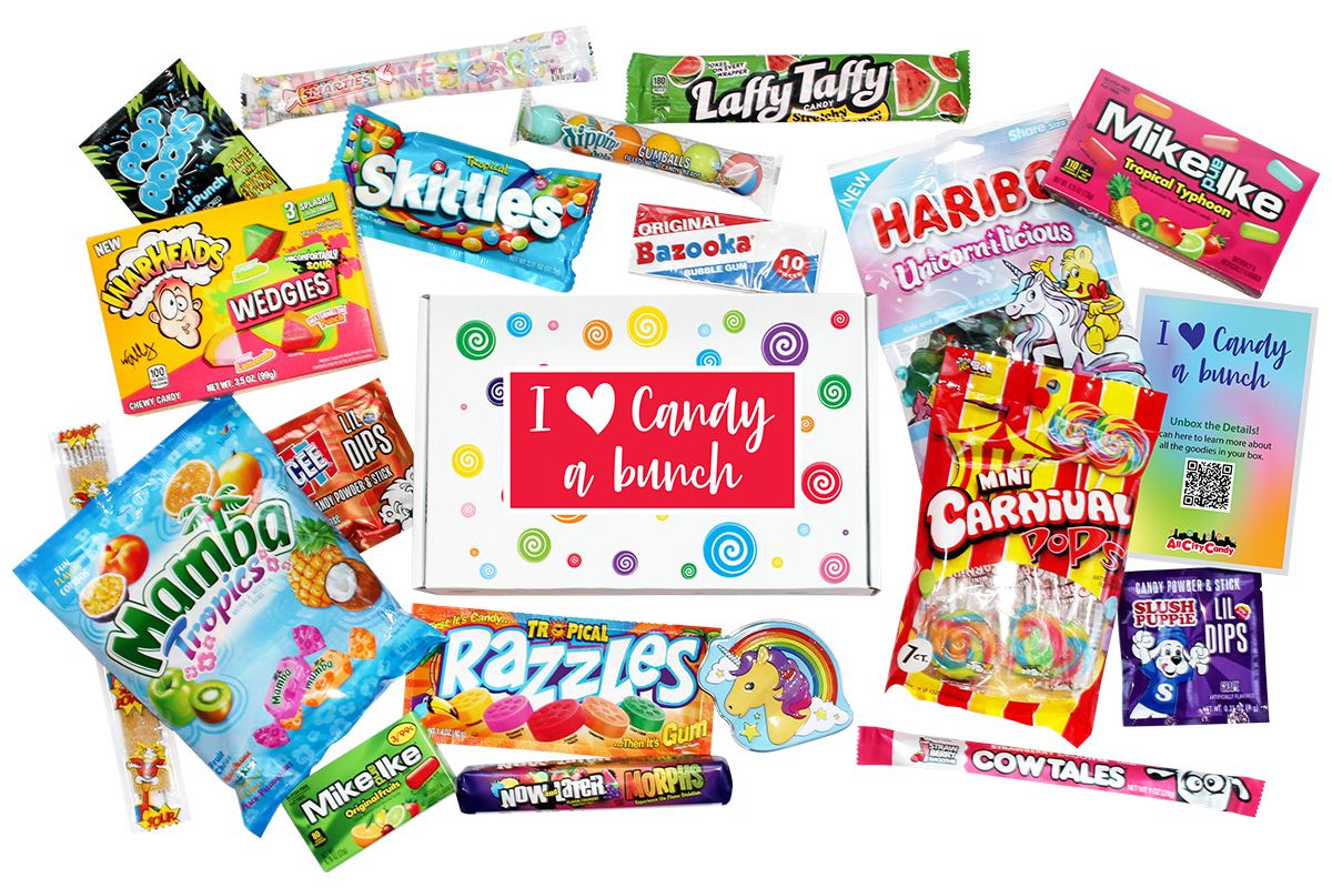 Colorful full print box with I heart sticker on top surrounded by all the sweet candy treats that would be included in the gift.  