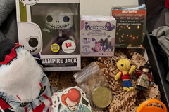 Halloween theme box has spooky and cute items including Nightmare before Christmas Funko, Halloween Fairy Lights It Socks and stickers