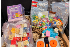 A Lego kids pack including an assortment of Lego play packs a Lego Controller and an Aphmau Mystery MeeMeows Box