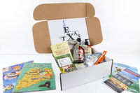 The Texas Box showcases some travel pamphlets, hot sauces, information on Texas and a view of quality made items from small businesses.