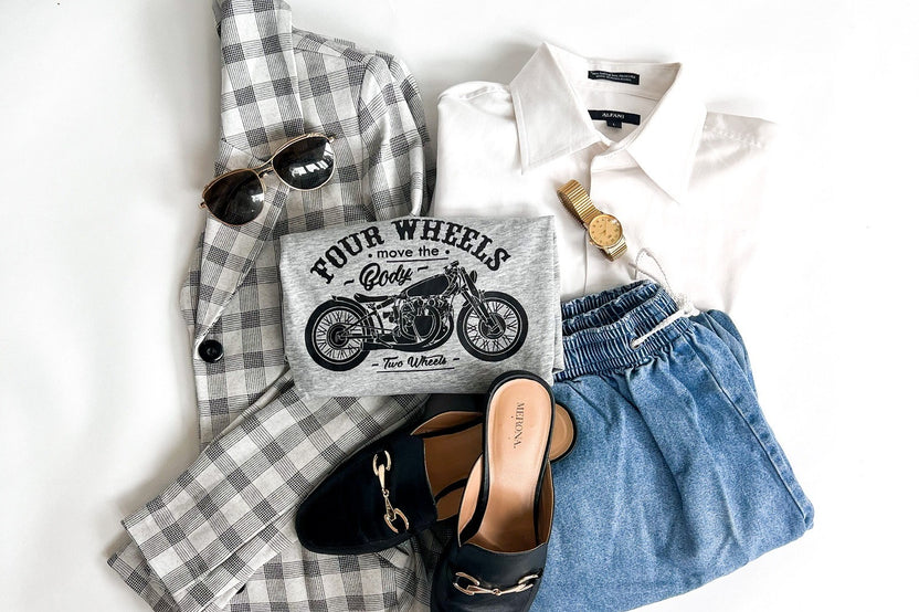 a plaid blazer, drawstring pants, a vintage t-shirt, and classic button down with loafers to complete the outfit 