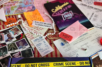 Previously released mystery titled California Screamin: 1989. Showing journal, evidence, and clues spread out on table. 