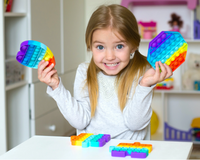 Kids love fidget toy boxes with quality fidgets inside every monthly box like rainbow bubbble pop its