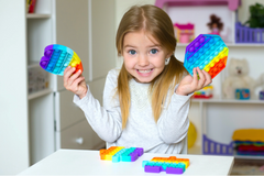 Kids love fidget toy boxes with quality fidgets inside every monthly box like rainbow bubbble pop its