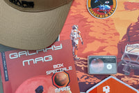 Space lover subscription box packed with galaxy-themed gifts, astronomy accessories, collectibles, and monthly surprises.