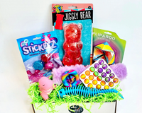Fidget Box 
•Jiggly Bear
•Fliparoo
•Stickeez Balls
•Fuzzy Bracelet or Stretch Fish Bones
•Snapperz
•White Bubble Pop
•Squirrel Pop Up