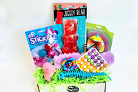 Fidget Box 
•Jiggly Bear
•Fliparoo
•Stickeez Balls
•Fuzzy Bracelet or Stretch Fish Bones
•Snapperz
•White Bubble Pop
•Squirrel Pop Up