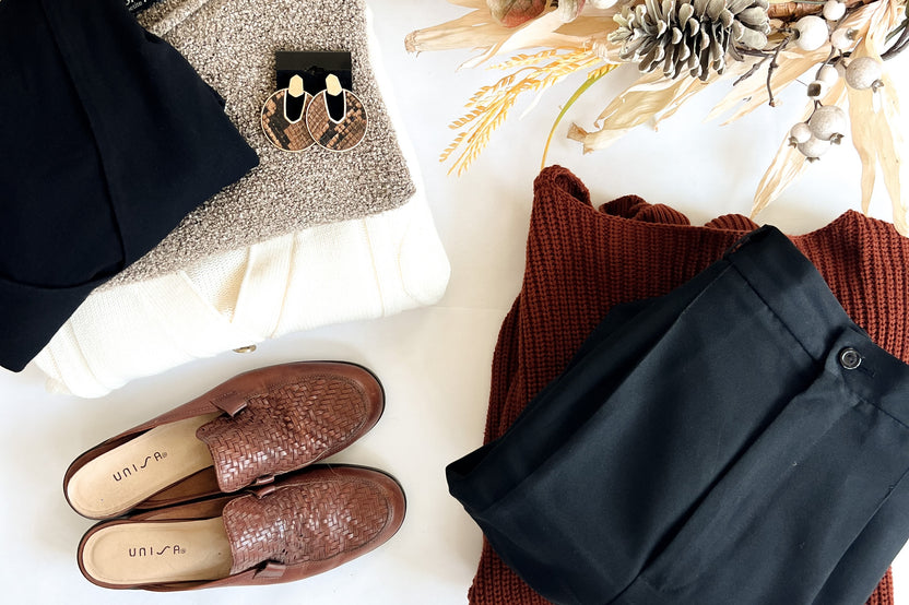 a beautiful collection of fall thrifted pieces including leather loafers, a cream cardigan, mock neck shirt and pleated pants