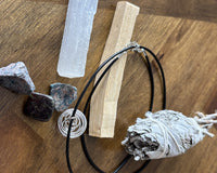 Find a quiet place where you won’t be disturbed. You don’t have to sit cross-legged but you can. Sit in a chair, on a cushion, or lay down.