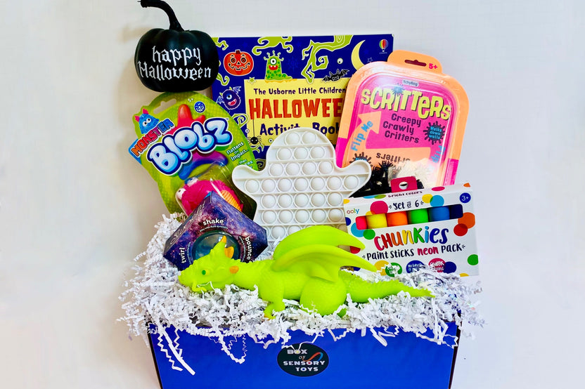 Halloween Box with Usborne Book, Scritters, Monster Blobz, Ghost bubble pop, Ooly Chunkies Markers, weighted Dragon toy, Copernicus sworld