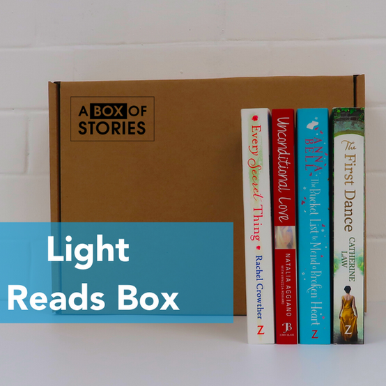 Brown subscription box filled with four young adult light reading books, featuring engaging stories and relatable characters for teen reader